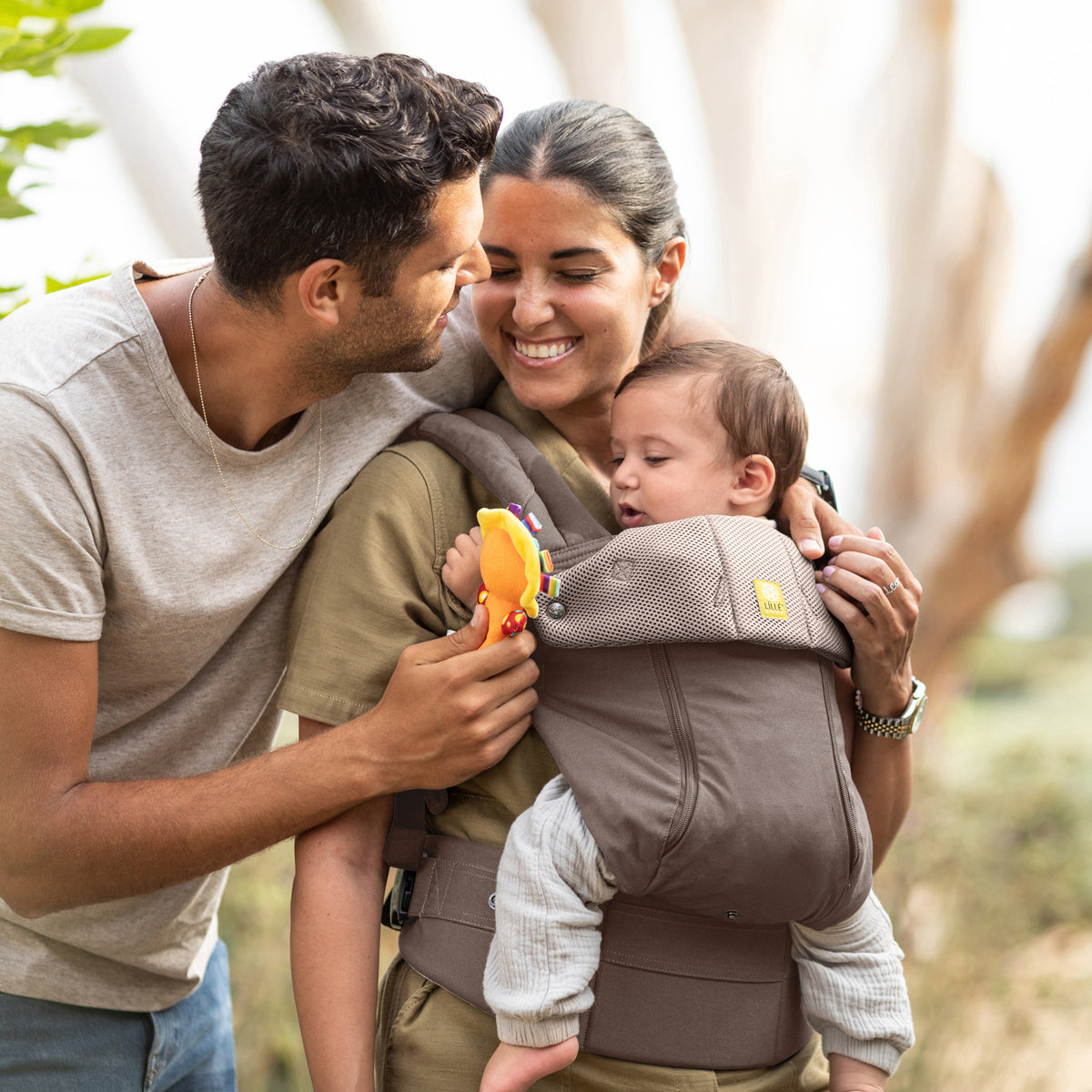 mom wearing baby in Complete 6-in-1 All Seasons in Bark