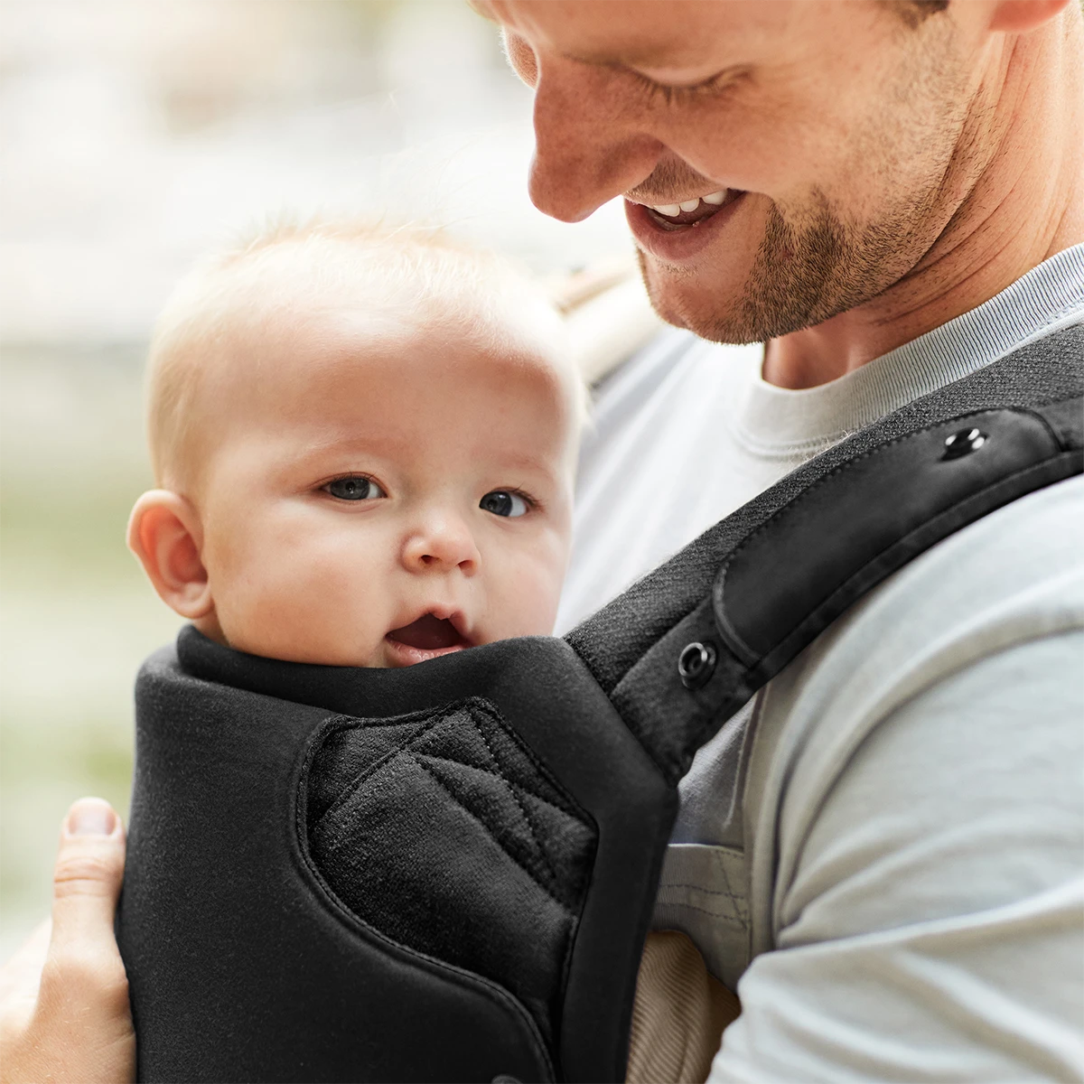 dad wearing baby in elevate carrier in basalt