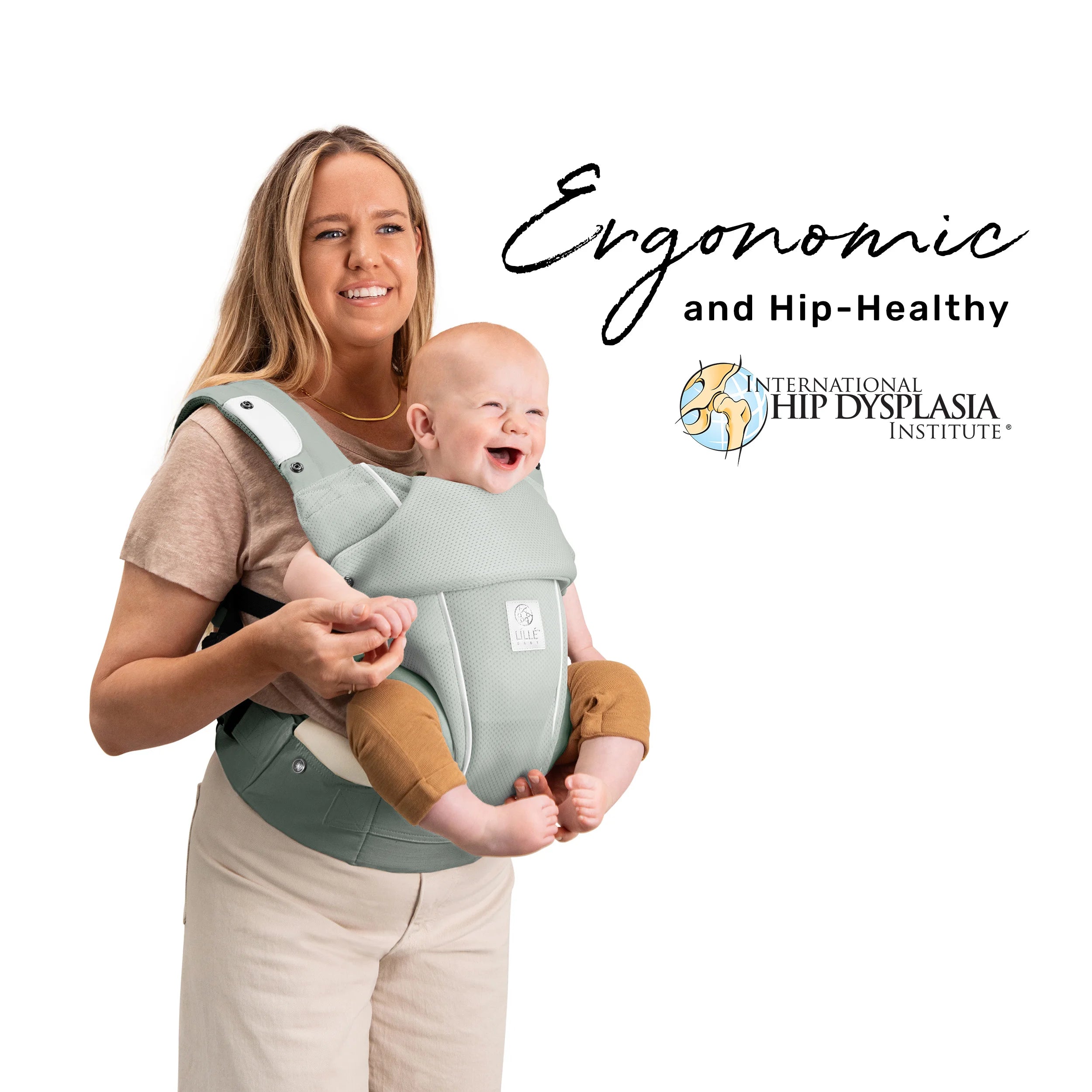 mom wearing baby in elevate air carrier. ergonomic and hip healthy by international hip dysplasia institute.