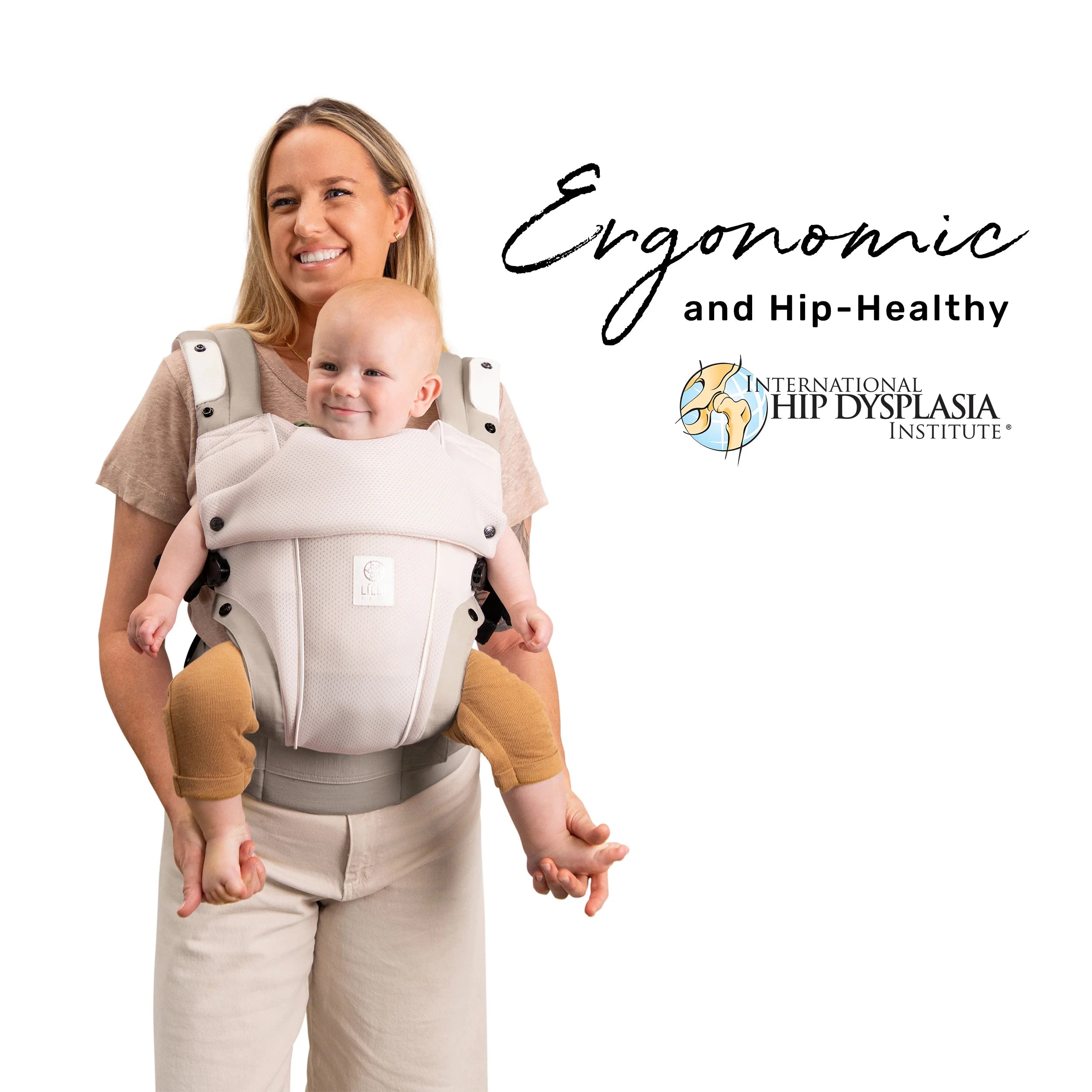 mom wearing baby in elevate air carrier. ergonomic and hip healthy by international hip dysplasia institute.